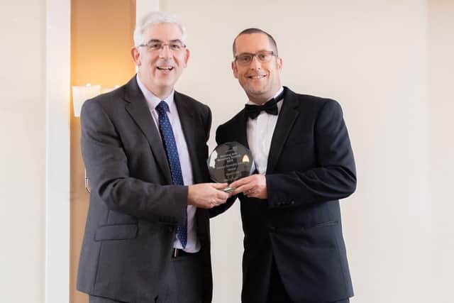 Glenn Lake, Chronic Pain Nurse Specialist, winner of the Clinical Specialist Award presented by Dr Mark Roland, Deputy Medical Director.