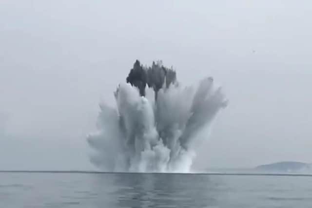Water soars as Royal Navy bomb disposal experts safely destroy a 2,000lb German sea mine, which was dredged up by a fishing boat. Picture: Portsmouth Naval Base on Twitter (@HMBNPortsmouth)