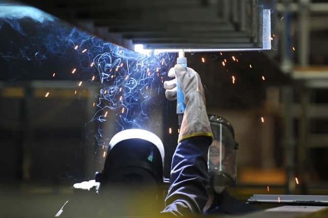 Welding taking place on the aircraft carrier HMS Queen Elizabeth. Picture: Sarah Standing (123196-8317)