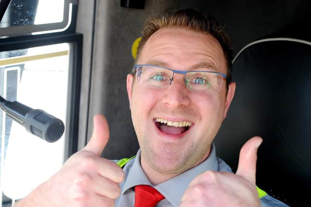 Fareham based Lucketts Travel coach driver Steve Small (38) from Gosport, is fast becoming an online sensation after videos of him giving comedy announcements on board have proved a hit with passengers.Picture: Sarah Standing (210519-9924)
