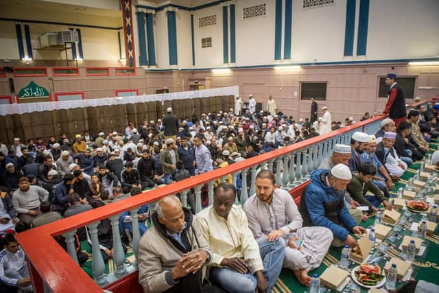 People waiting to break their fast at the Jami Mosque in Portsmouth on Tuesday. Picture: Habibur Rahman