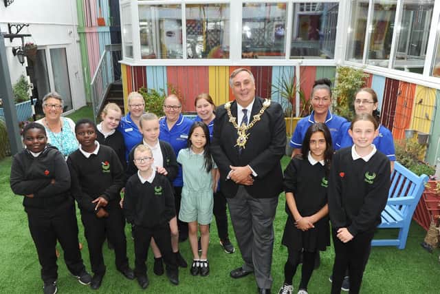 The Lord Mayor of Portsmouth David Fuller with staff from Bluewater care home and children from Flying Bull Academy, in the new sensory garden
Picture: Sarah Standing (200519-9635)