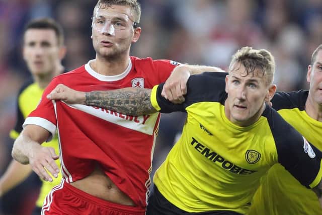 The defender has moved to the Sky Blues on a free transfer after 42 appearances and nine goals for Burton this season.