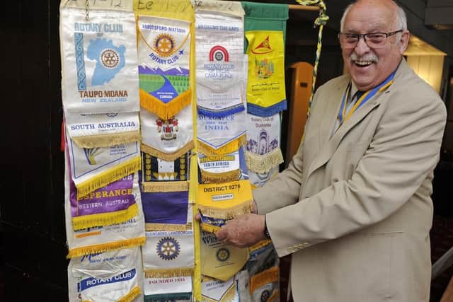 Chris Roberts, President of Havant Rotary, with various insignia brought back to the UK from members travels.
Picture: Ian Hargreaves  (160519-7)