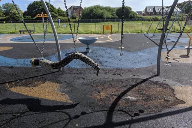 A half-burned rope swing, scorched rubber surface and exposed spikes after a blaze at Grove Road Recreation Ground, Gosport. Picture: Katie Kirk