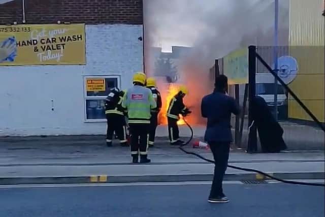Crews battle the car fire in Rodney Road, Fratton, last night