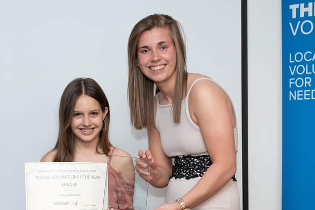Winner of The Young Volunteer of the Year - 12 year old Grace Marshall (left)given out by Holly Walker (right) Kick Start Sport.