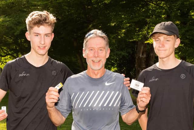 Tony Hoskinson, centre, with sons Tom (left) and Dan (right). Havant parkrun
