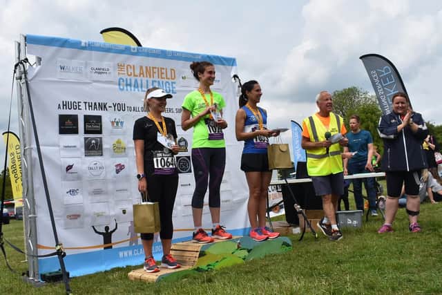First lady Marjorie Huet-Martin, centre, with second-placed Naouele McHugh, right, and third-placed Lisa-Marie Peckover. Clanfield Challenge. Picture: Alan Dunk