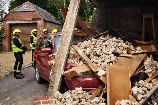 Car covered in rouble after crash. Picture: Droxford Fire Station/ Twitter