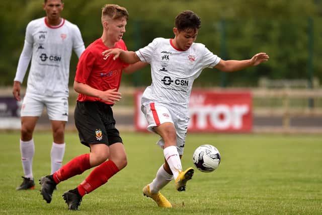 New Pompey youngster Gerard Storey, left, in action for Co. Antrim in the SuperCupNI 2018 Premier section Picture: Stephen Hamilton/Presseye
