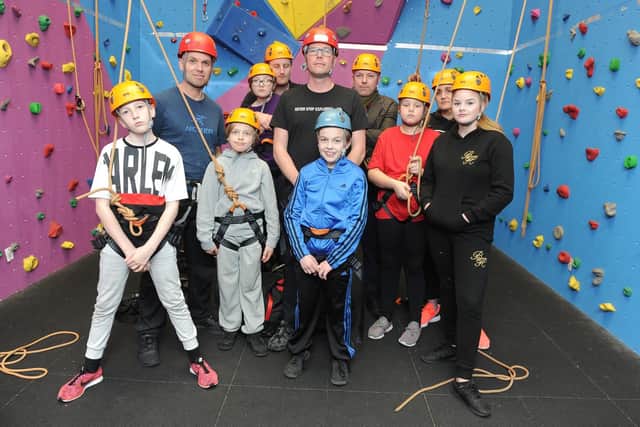 Gary Clark with some of the parents and children that he teaches at the Harbour School Climbing Wall, Portsmouth.
Picture: Habibur Rahman
