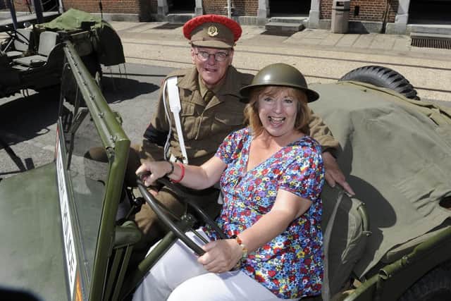 D-Day event at Portsmouth Historic Dockyard. (l to r), Wartme re-enactor Colin Taylor with visitor Sally Storey from Portsmouth. Picture: Ian Hargreaves (010619-8)