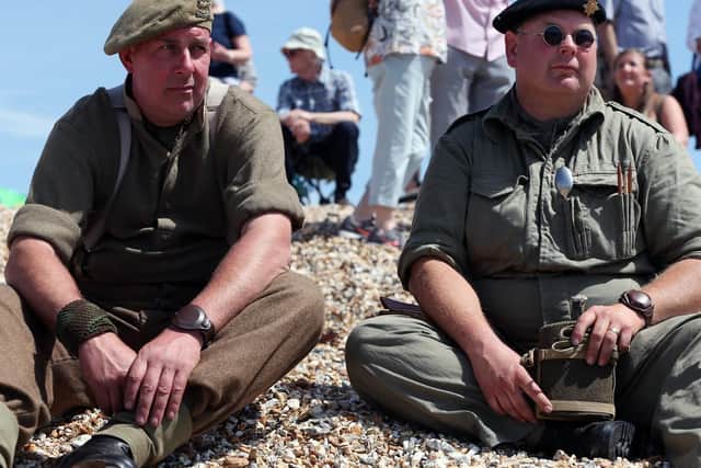 D-Day event at Stokes Bay, Gosport. Ian Taylor, left, and Aaron Davies, both from the Tommy Atkinson Society. Commemorative D-Day event at Stokes Bay highlighting the part that the borough of Gosport played in 1944. Picture: Chris Moorhouse (010619-36)
