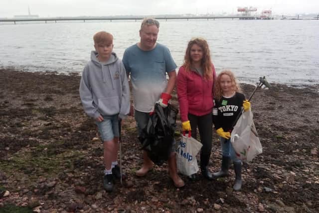 Helen Sarimanolis-Selby and husband Paul Selby with their children, Ethan, 12, and Megan, 8.