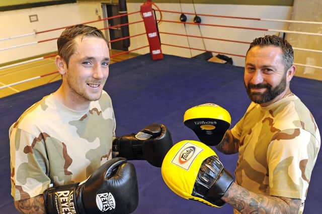Paulsgrove boxer Daryl Thomson, left, and boxing coach and promoter Wesley Shipp, who are staging a boxing event to raise money for the care of Daryl's girlfriend, Amber Fountain, who has been left with serious brain damage following a cardiac arrest. Picture: Ian Hargreaves  (010619-1)