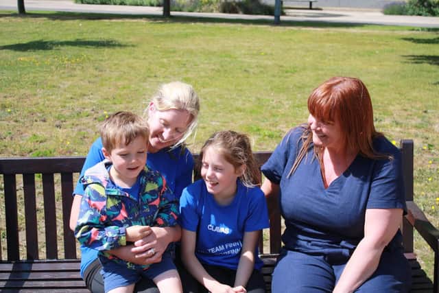 Jenny Evans (left) with her son Finn, 5, daughter Olivia, 8, and Operations Midwife Matron at PHT Kerry Madgwick