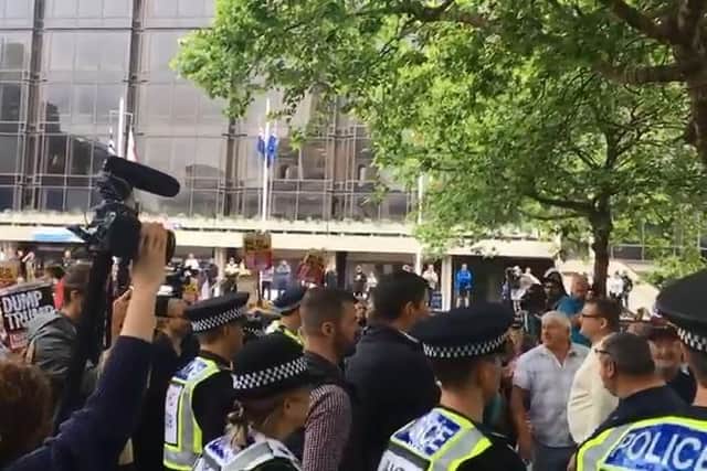 Protesters face off in Guildhall Square