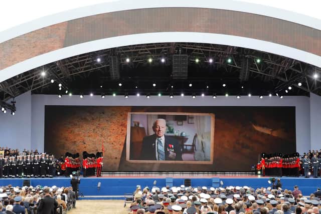 Guests watch during an event to commemorate the 75th anniversary of the D-Day landings, in Portsmouth. Picture: TOLGA AKMEN/AFP/Getty Images