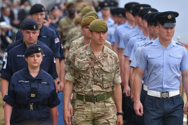 Members of the British Navy, Army and Royal Air Force (RAF) take part in an event to commemorate the 75th anniversary of the D-Day landings, in Portsmouth. Picture: MANDEL NGAN/AFP/Getty Images