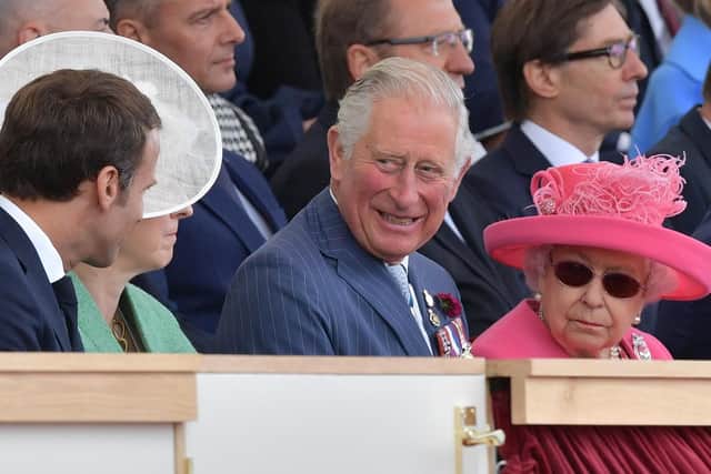 French President Emmanuel Macron (L), Britain's Prime Minister Theresa May, Britain's Prince Charles, Prince of Wales and Britain's Queen Elizabeth II attend the event. Picture: DANIEL LEAL-OLIVAS/AFP/Getty Images