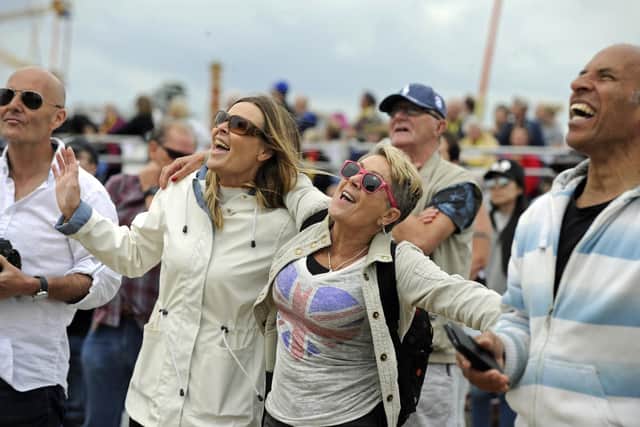 Crowds enjoy the D-Day celebrations on Southsea Common as they sing along to We'll Meet Again.
Picture: Ian Hargreaves  (050619-8)
