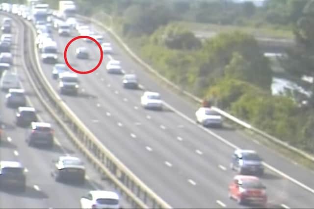 The broken-down car pictured in the central lane of the A27, just before the Portsbridge Roundabout at Hilsea. Picture: Highways England