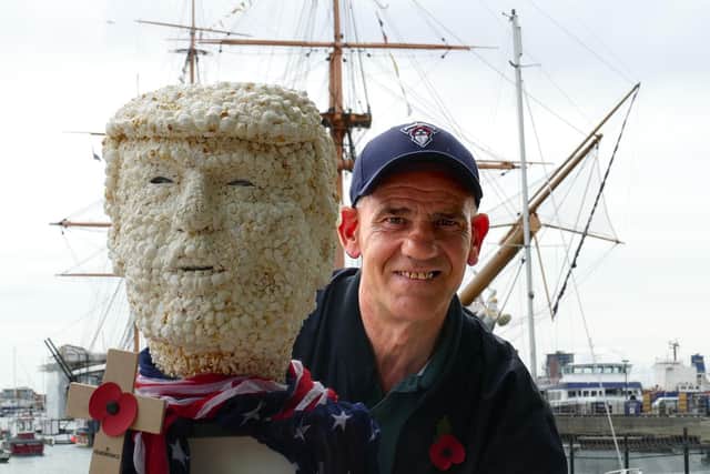 Breandan Keating, from Portsmouth, pictured alongside the popcorn model of Donald Trump, made by Kevin Keating. Picture: Kevin Keating