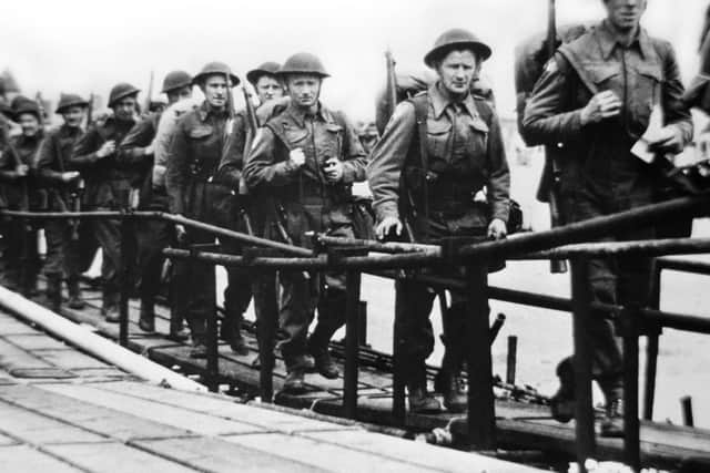 June 5, 1944 of the British troops embarking at Southsea, Portsmouth in England, before a landing craft on June 6, 1944 while Allied forces storm the Normandy beaches on D-Day. (Photo credit should read -/AFP/Getty Images)