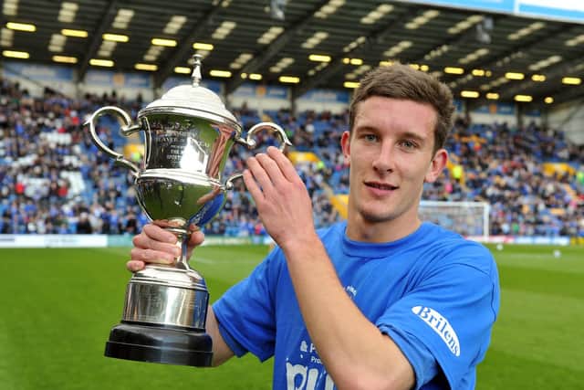 Jason Pearce with The News/ Sports Mail Player of the Season trophy. Picture: Steve Reid