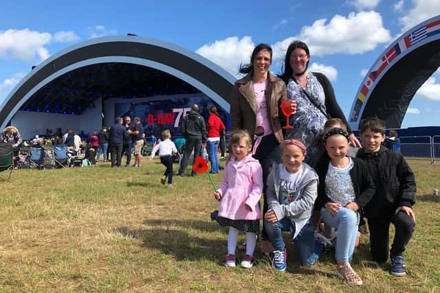 Sisters in law Donna and Rachel Chandler with their children, at Portsmouth Revival