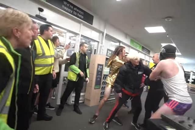 YouTube prankster Lee Marshall, 34, who goes by the name DiscoBoy on the streaming site has been convicted of assault by beating against an Asda supermarket night manager.
Pictured: Lee Marshall in a vest and shorts, and wearing a hat, launched himself at the night manager, prosecutors said