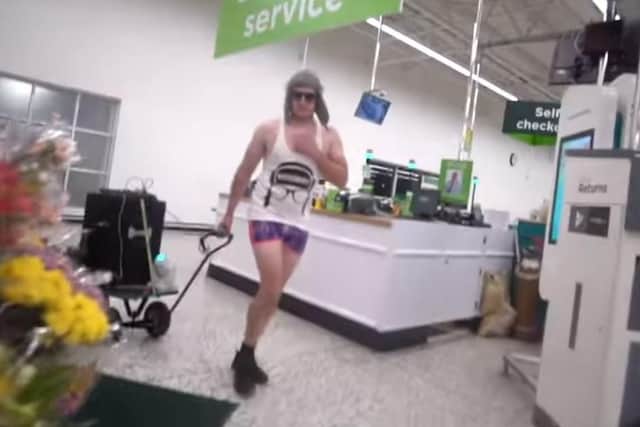 YouTube prankster Lee Marshall, 34, who goes by the name DiscoBoy on the streaming site has been convicted of assault by beating against an Asda supermarket night manager.
Pictured: Lee Marshall wearing shorts, a vest and a hat inside the Asda store