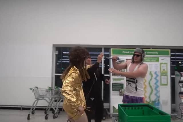 YouTube prankster Lee Marshall, 34, who goes by the name DiscoBoy on the streaming site has been convicted of assault by beating against an Asda supermarket night manager.
Pictured: Lee Marshall wearing shorts, a vest and a hat inside the Asda store