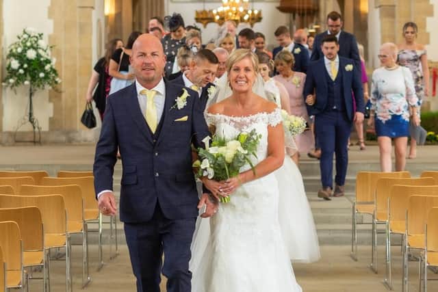 Tracy and Mick walking down the aisle. Picture: Carla Mortimer Photography