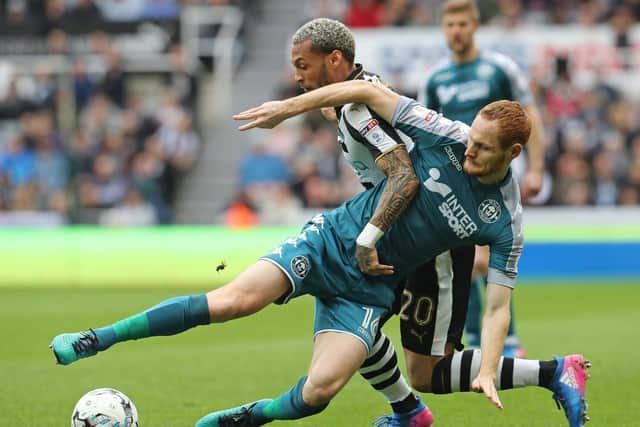 Thirty-year-old midfielder has joined newly-relegated Rotherham on a free after three years at the Latics