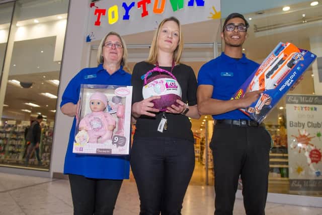Toy town has opened in Cascades, Portsmouth. Staff, Michelle Aird, Stella Haines and Iftikar Ahmed