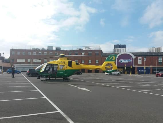 Air ambulance has landed at the car park at the back of the Cascades shopping centre. Picture: Priya Mistry