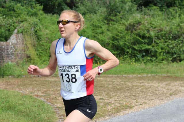 City of Portsmouth's Emma Jolley on her way to victory in the Purbrook Ladies 5. Picture: David Brawn
