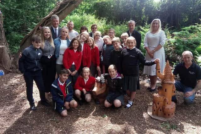 Summer's classmates at the opening of the fairy garden.