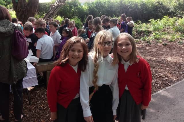 Summer's friends, from left, Jasmin Carter, 10, Maddison O'Neil, 11, and Maddie Ashby, 11