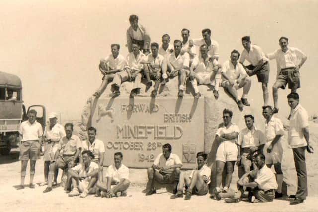 Men from Portsmouth dockyard at the Alamein Memorial.