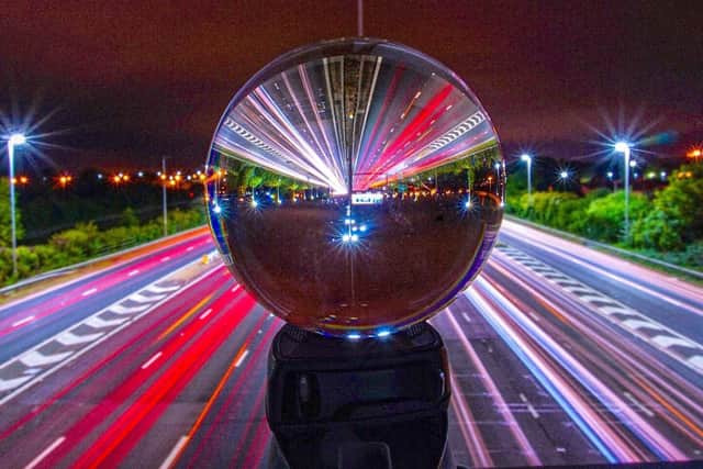 M275 motorway car light trails using lensball by Neil Harris.