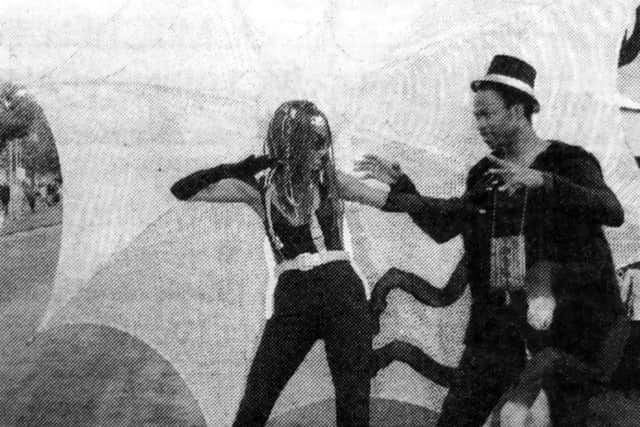 Leading the Caribbean Island Associations float, the Merry Black Widow, around the streets of Southsea is 32-year-old Camille Jacobs, complete with a web, and Mascot Amiah in 1994