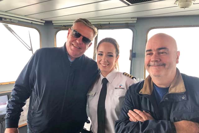 Captain Alice Duncan (centre) with Suggs and Madness. Picture: Red Funnel Ferry