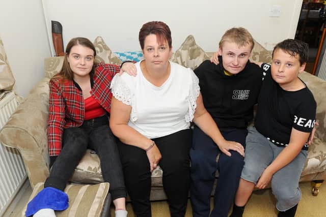 Rebecca Gibbs, 45, with her children Katie, 14, George, 18 and Joby, 12. Picture: Sarah Standing