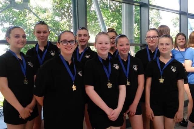 The age 13-15 team from Portsmouth and District Synchro Club won gold medals at the South East Regional Synchro Competition at the K2 Crawley