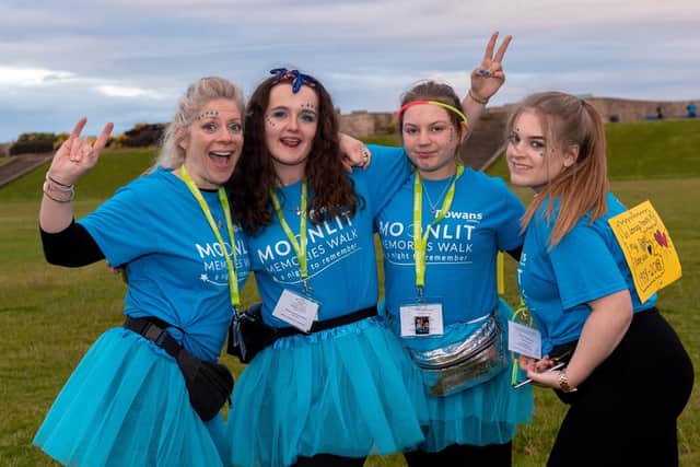 Moonlit Memories Walk 2019 for Rowans Hospice along the Seafront and Old Portsmouth - Pictured (l-r) Debbie Piper, Lauren Bridges, Megan and Abigail Piper who were walking in memory of Steve Piper. Picture: Vernon Nash (150619-001)