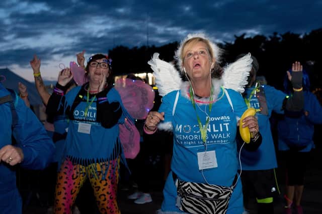 Moonlit Memories Walk 2019 for Rowans Hospice along the Seafront and Old Portsmouth - The Zumba warm up dancing. Picture: Vernon Nash (150619-020)