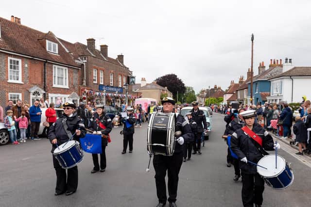 The carnival parade processes through the streets of Portchester to Portchester Castle. Picture: Vernon Nash (150619-048)